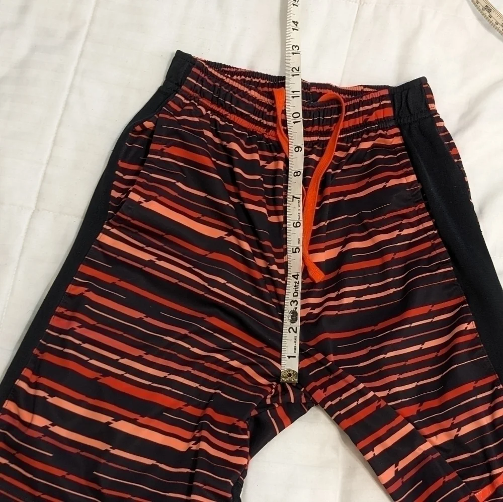Nike Dri-Fit striped athletic shorts with an elastic waist size Large
